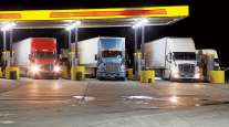 Trucks fueling at a truck stop