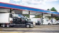 Trucks fueling at a truck stop