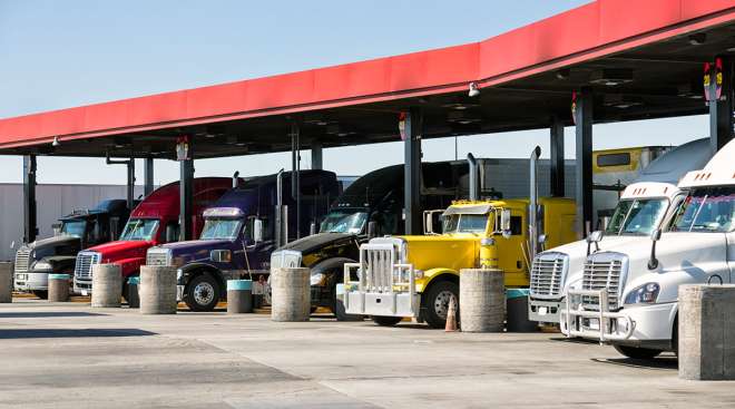 Trucks at a fueling station